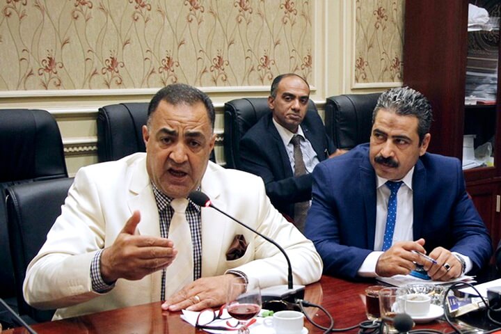 In this Sept. 8, 2016, photo, Egyptian Parliamentary member Ilhami Agena, left, attends the human rights committee in Cairo, Egypt. An independent Egyptian daily says the stateโ€s top womenโ€s advocacy group has filed a complaint with the chief prosecutor against the lawmaker who called for mandatory virginity tests for women seeking university admission. (AP Photo/Lobna Tarek)